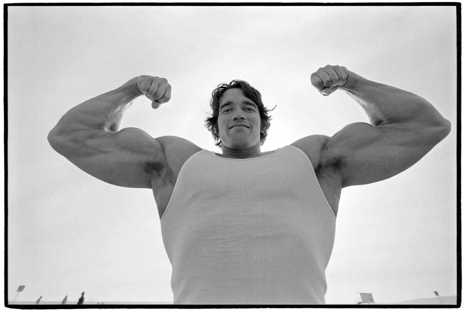 Arnold Schwarzenegger flexing, Al Satterwhite, 1976