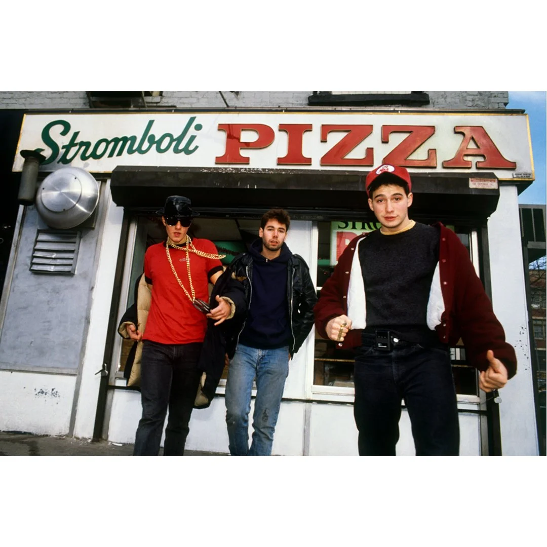 The Beastie Boys outside Stromboli Pizza by Lynn Goldsmith.