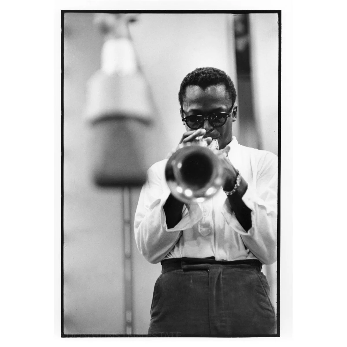 Miles Davis recording in New York 1956 by Don Hunstein