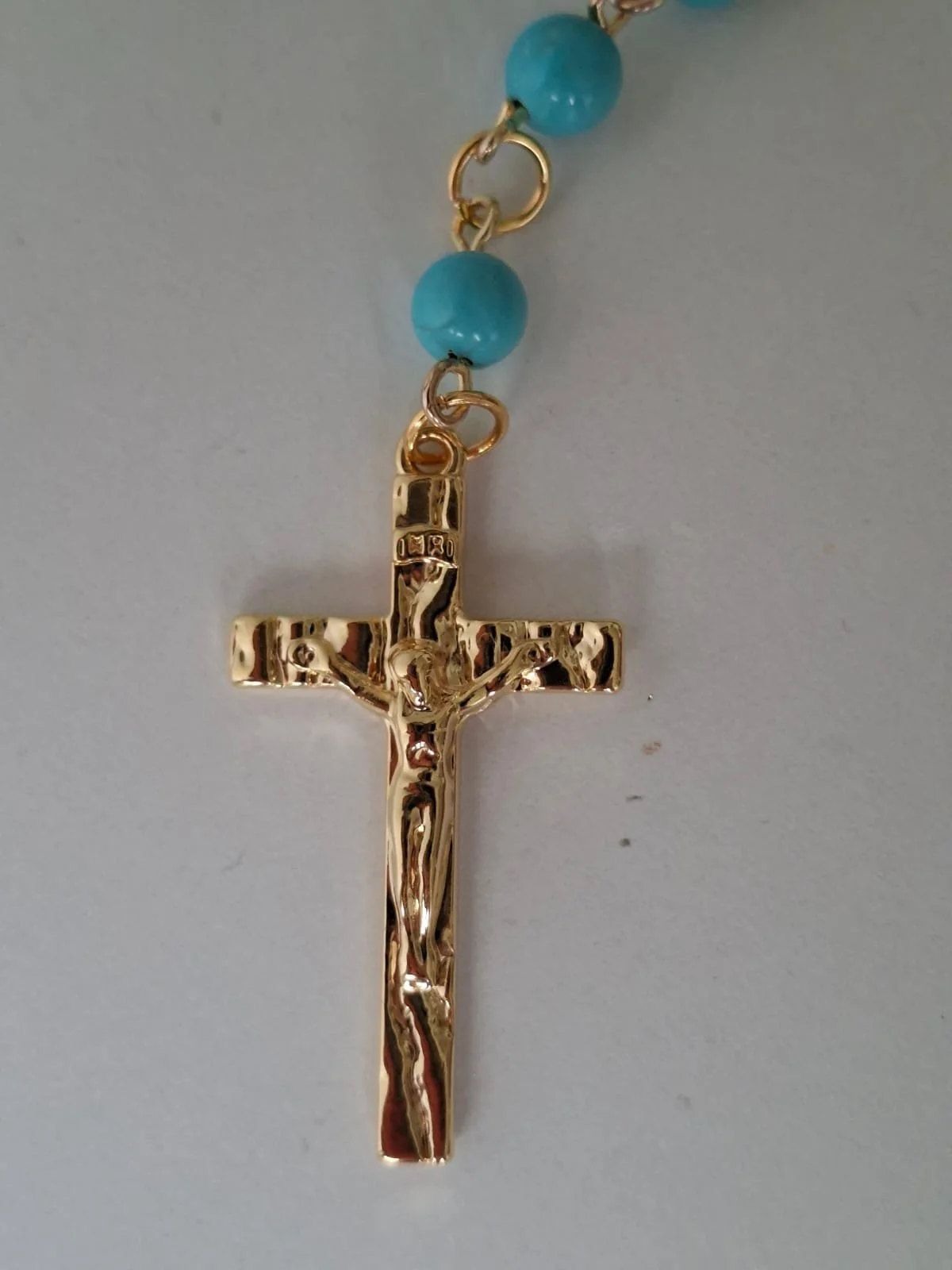 crucifixo turquesa.jfif