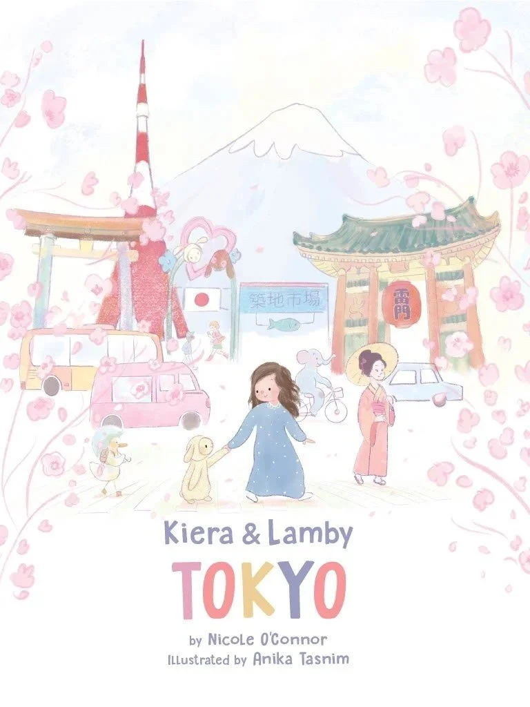 Illustrated cover of a children's book titled "Kiera & Lamby: Tokyo" by Nicole O'Connor showing a girl with a stuffed lamb, a woman in traditional kimono strolling in Tokyo with Mount Fuji, cherry blossoms, and a shrine in the back.