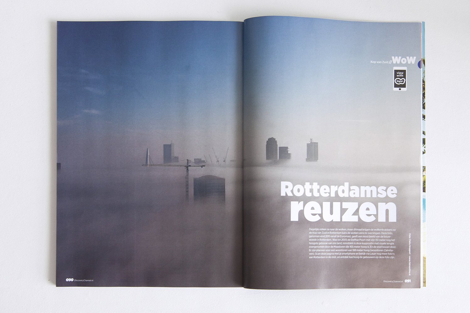 Discovery magazine spread featuring a foggy cityscape of Rotterdam.