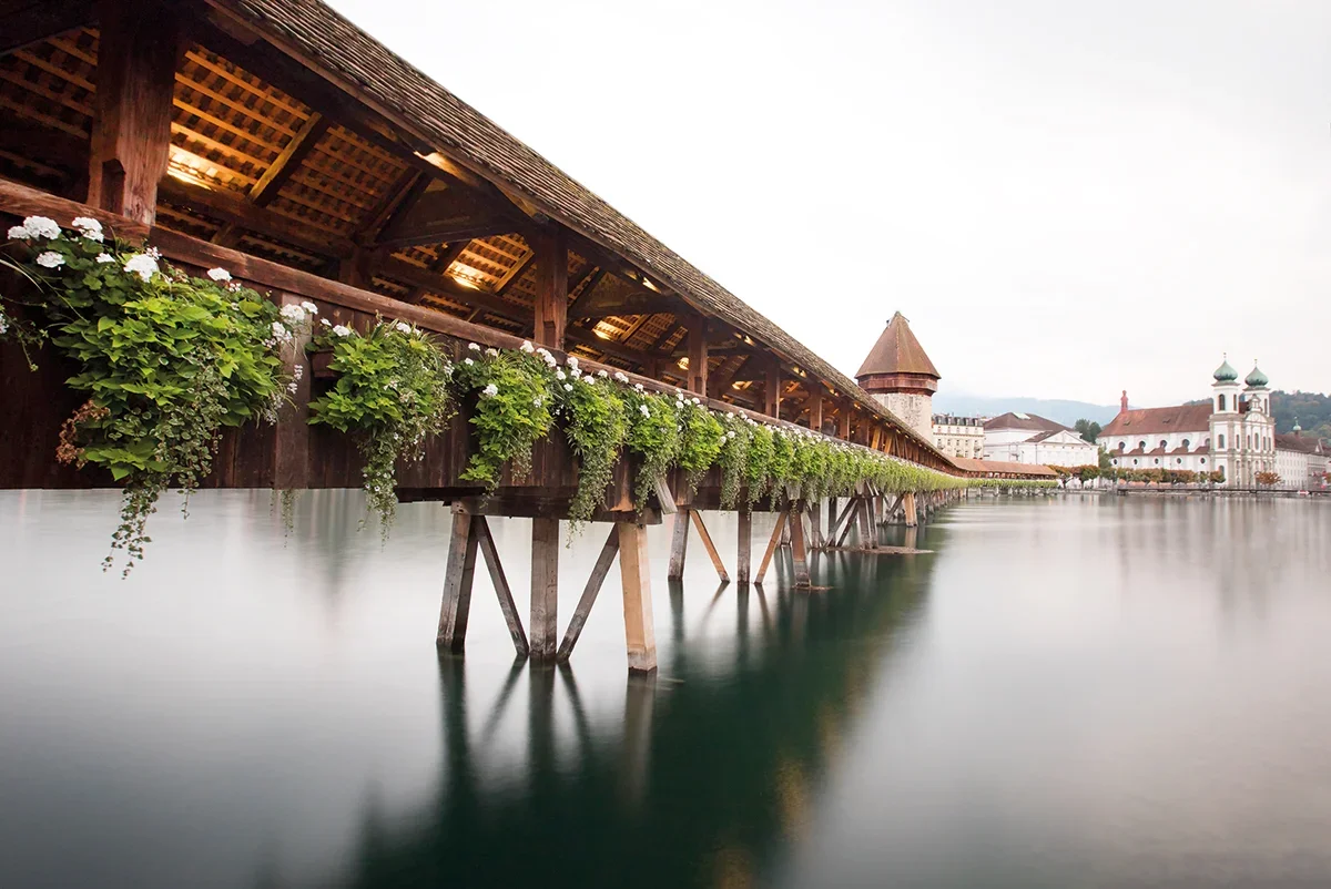 Claire-Droppert_commissioned_Switzerland_Tourism_Lucerne_Chapel_Bridge_switzerland.webp