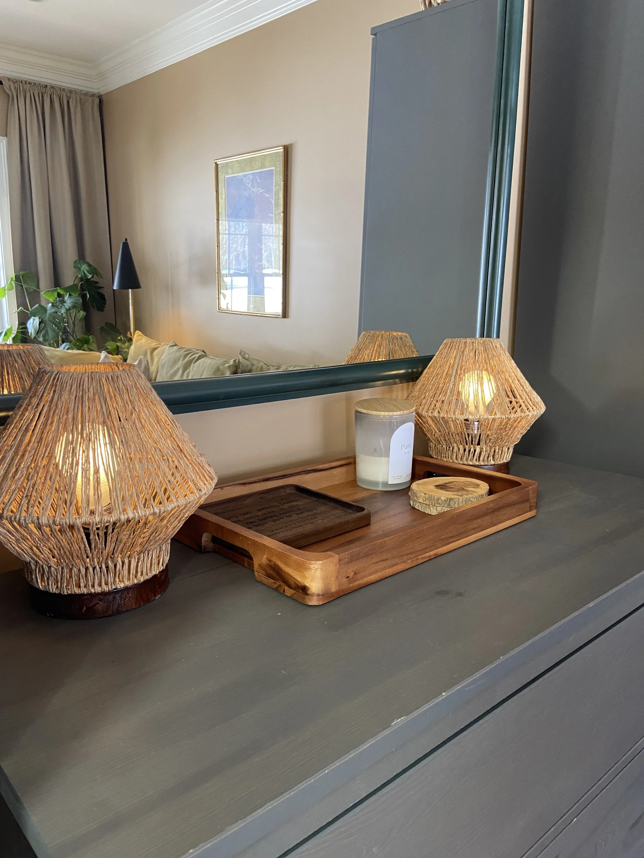 Calm minimalist front room with beige colors and earthy textures.
