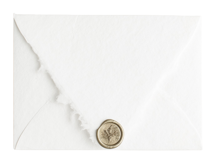flip-target A white envelope sealed with a detailed gold wax seal featuring a floral design. The envelope's elegant, vintage appearance adds a touch of nostalgia.