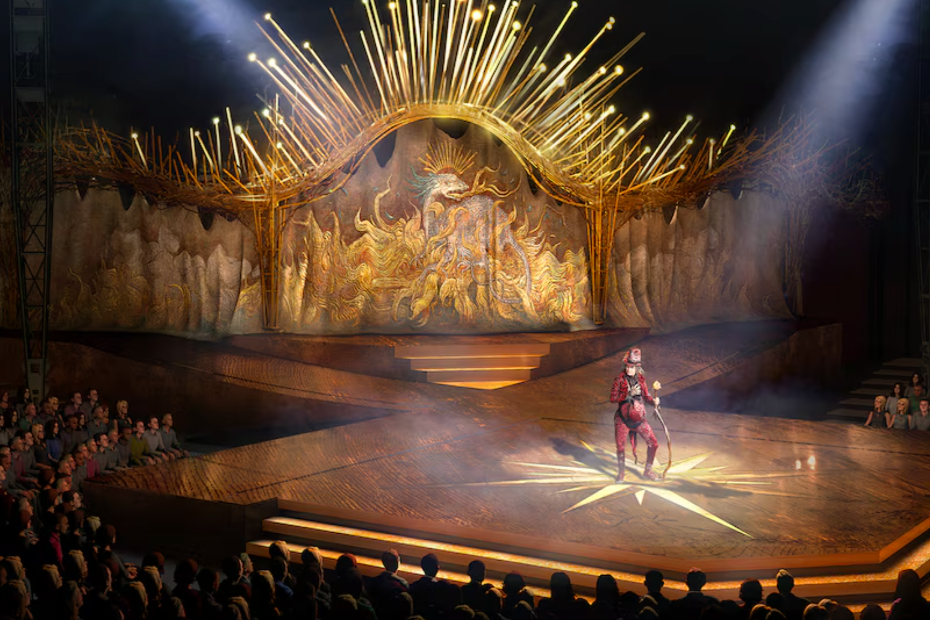 A circus stage with a golden dragon and firework-like props above it. A performer in a red and black costume is on stage, with audience members watching from the front seats.