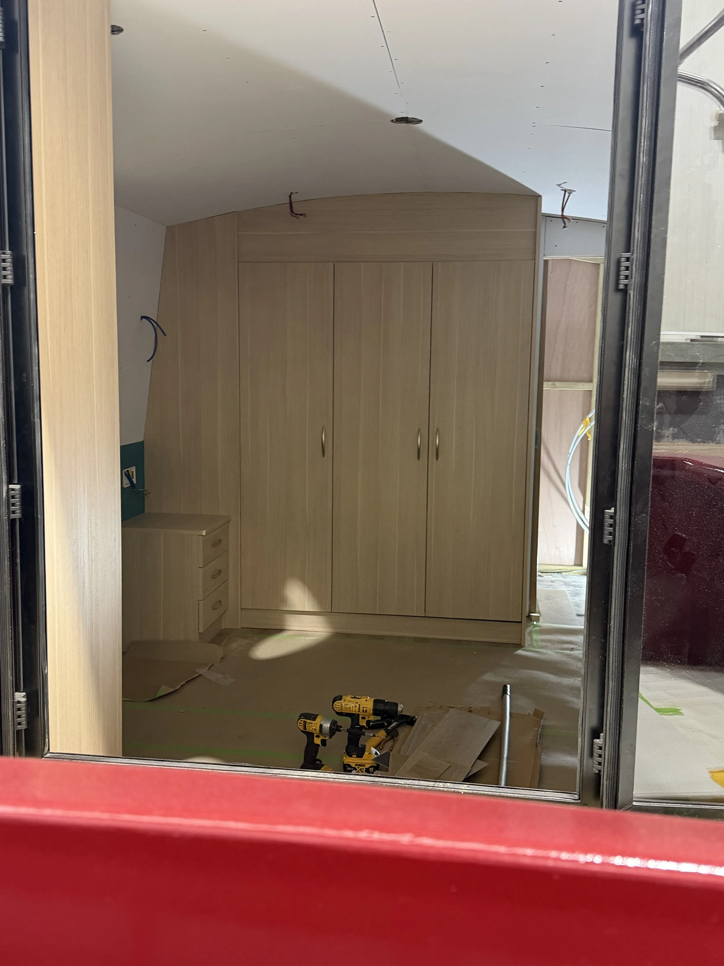 Bespoke fitted narrowboat bedroom cabinetry by Central Boatin