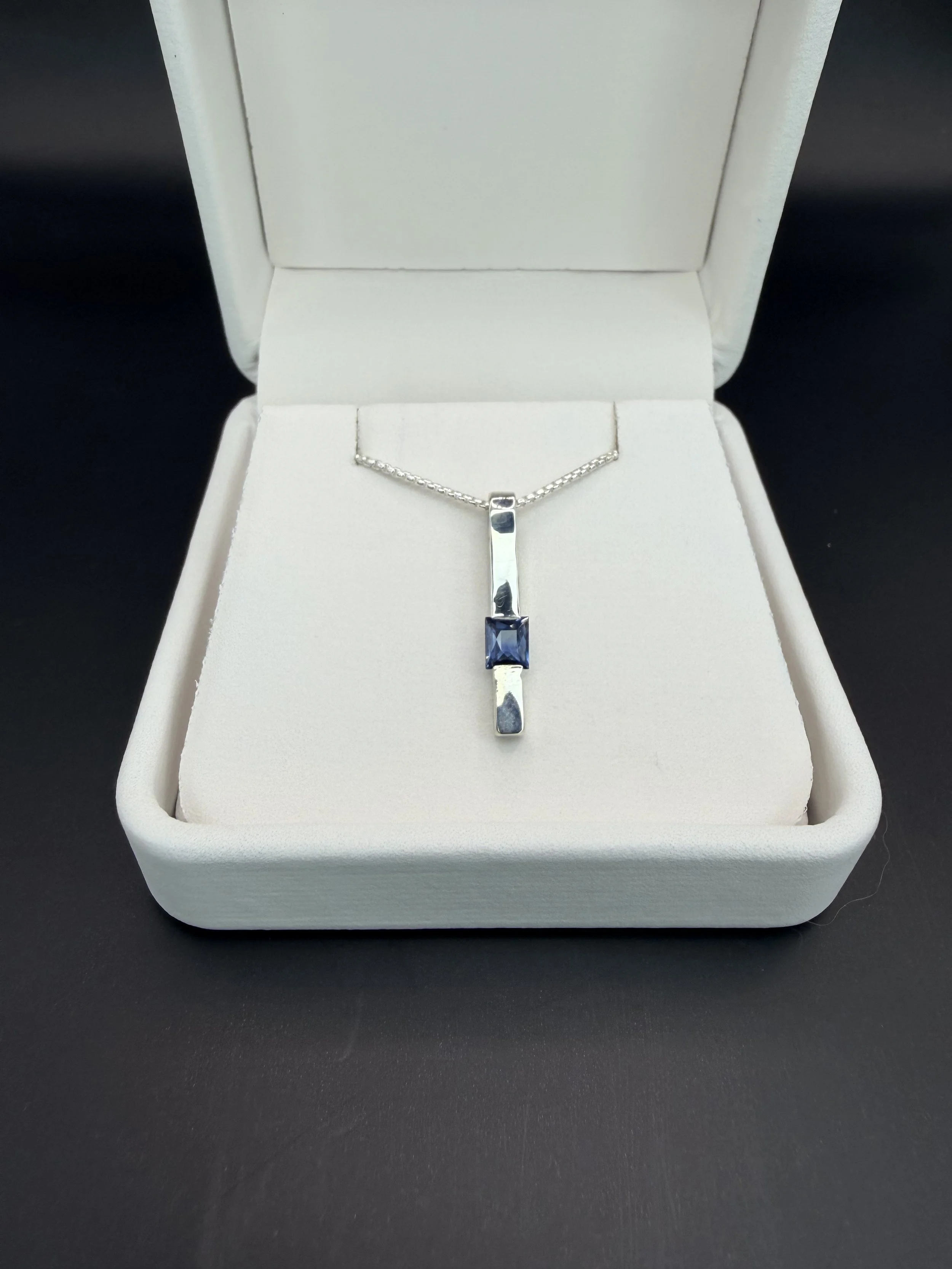 Sterling Bar Pendant with Medium Blue Step-Cut Sapphire