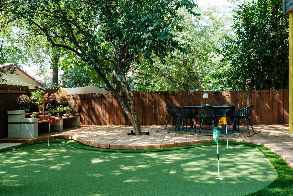 Backyard putting green and patio, Austin