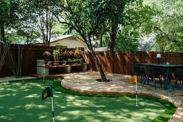 Backyard putting green and dining patio, Austin