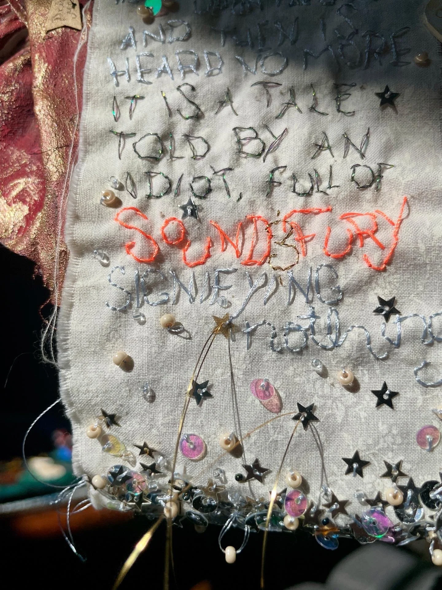 Embroidery on the mad tea party tablecloth from Shakespeare’s Macbeth
