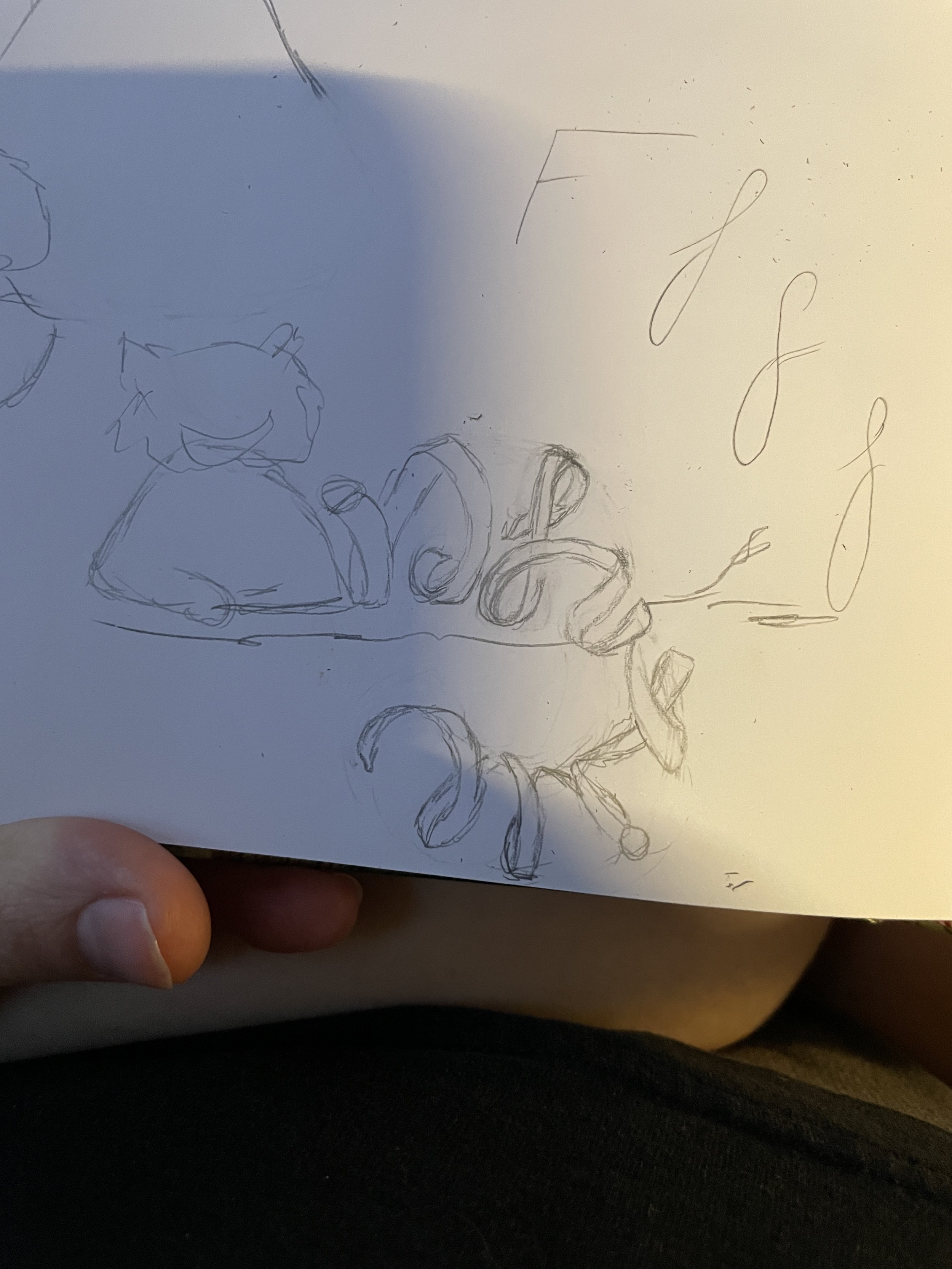 Initial sketching of Cheshire Cat’s ribboned typographic tail