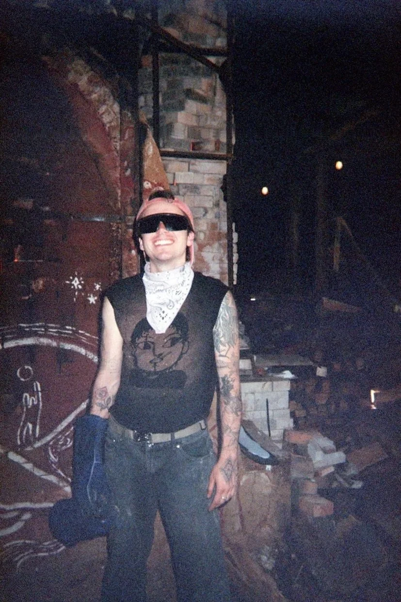 Dan in their firing gear. Disposable camera photo by Jules.