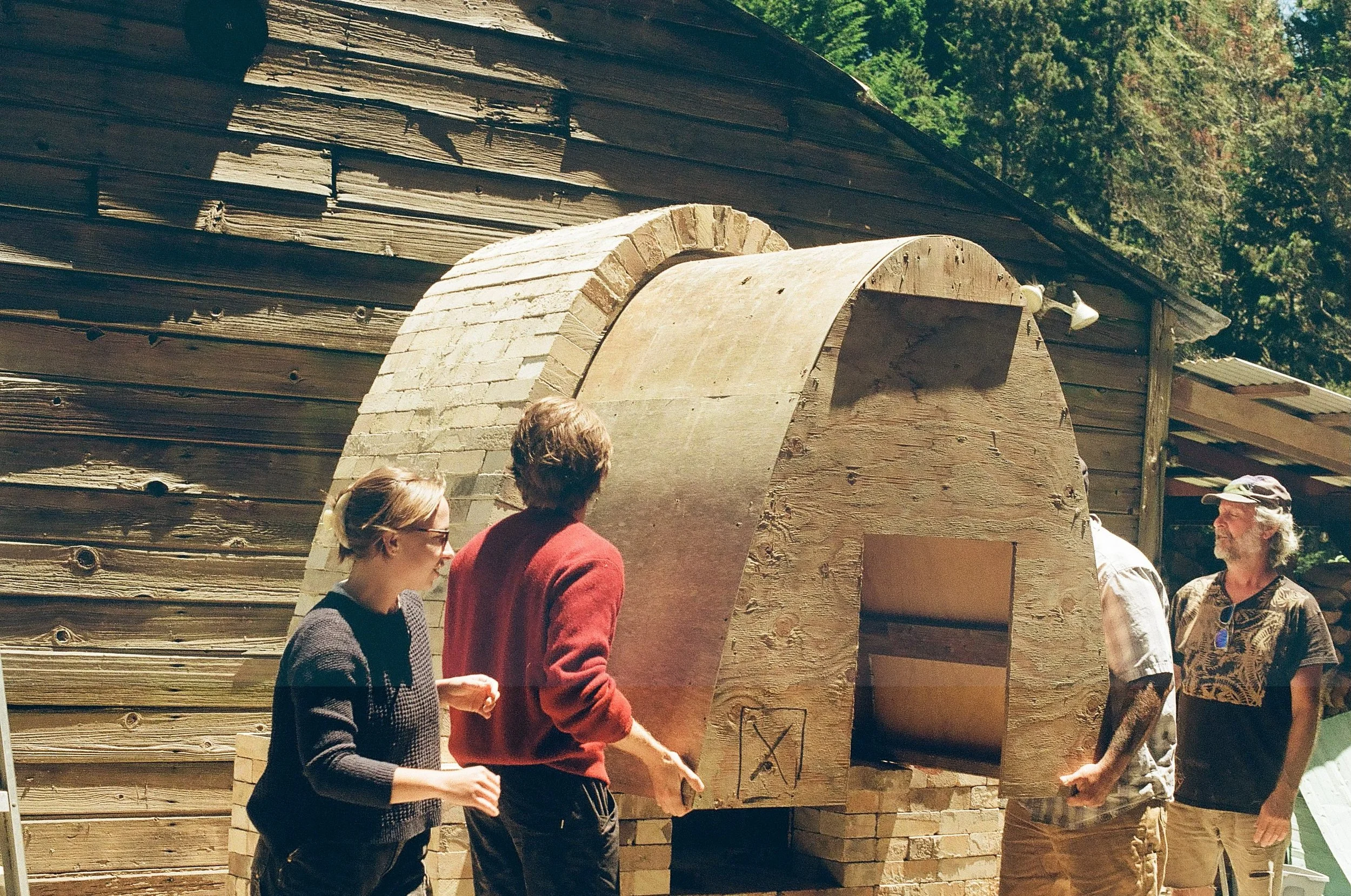 Jules, Ben, Nick, and Eli pulling out the arch frame. Photo by Nathan Martin.