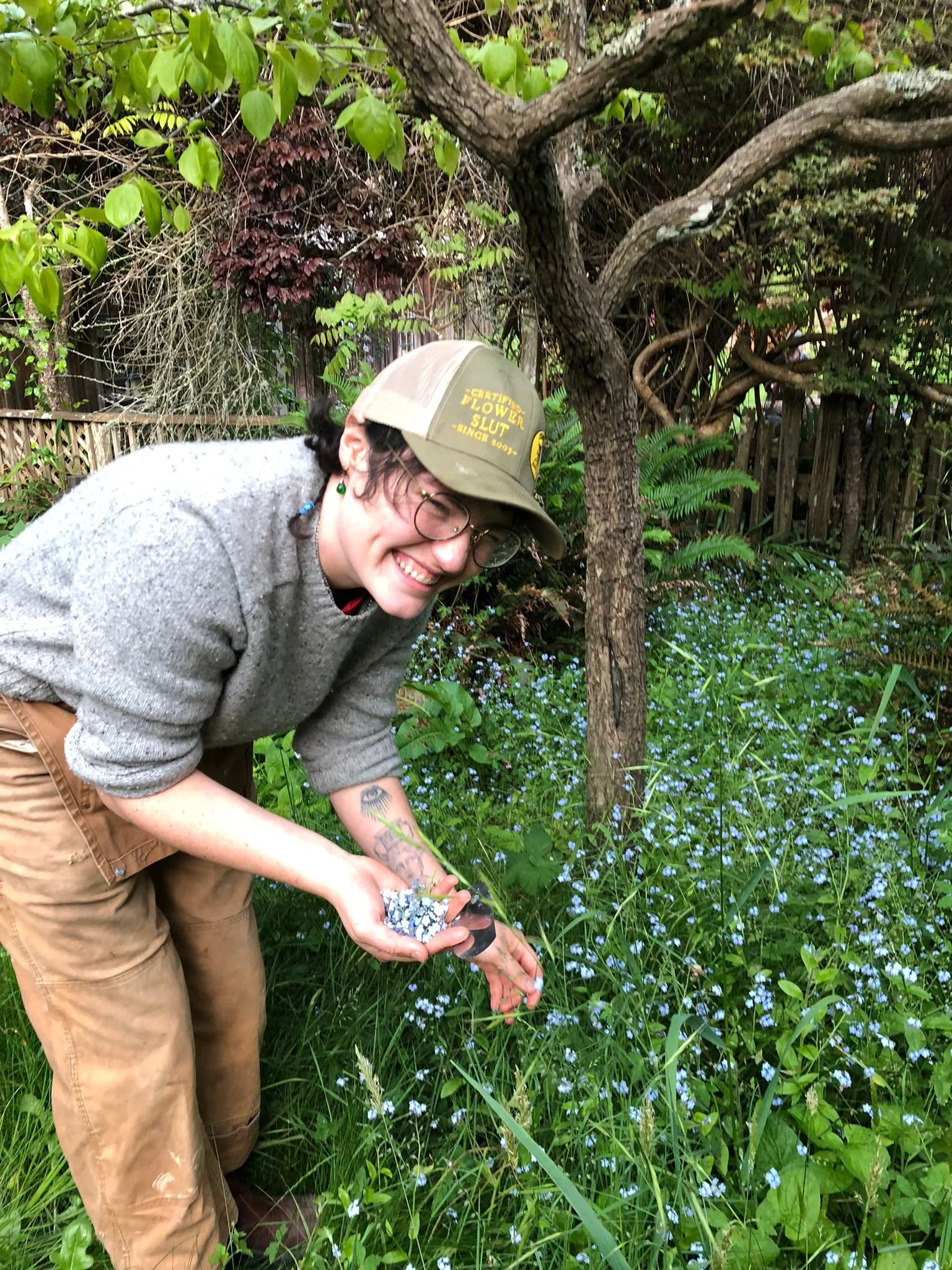 Summer harvesting Forget Me Not's in their Flower Slut hat