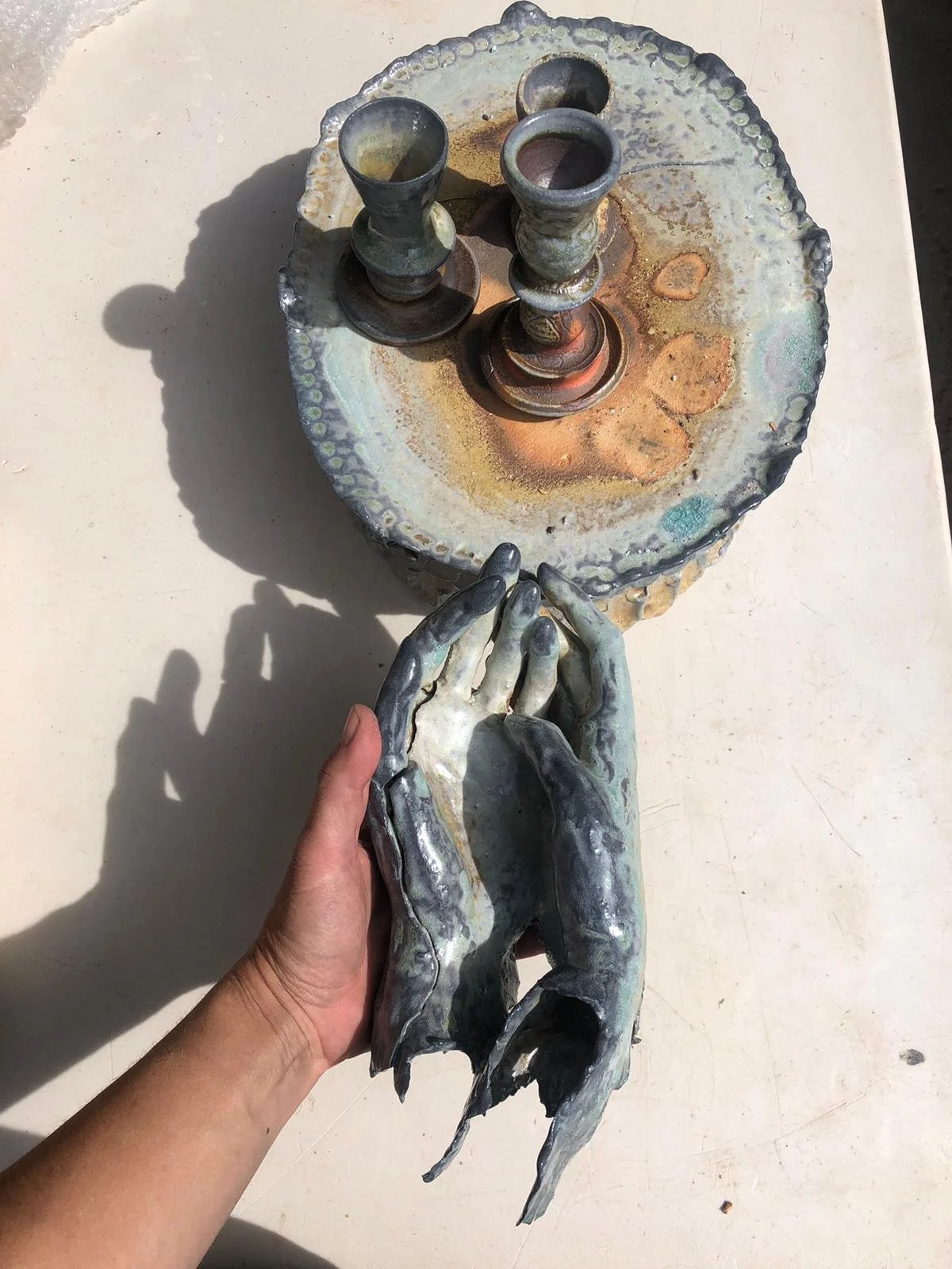 Holding Dan's hands. Candlesticks by Jules