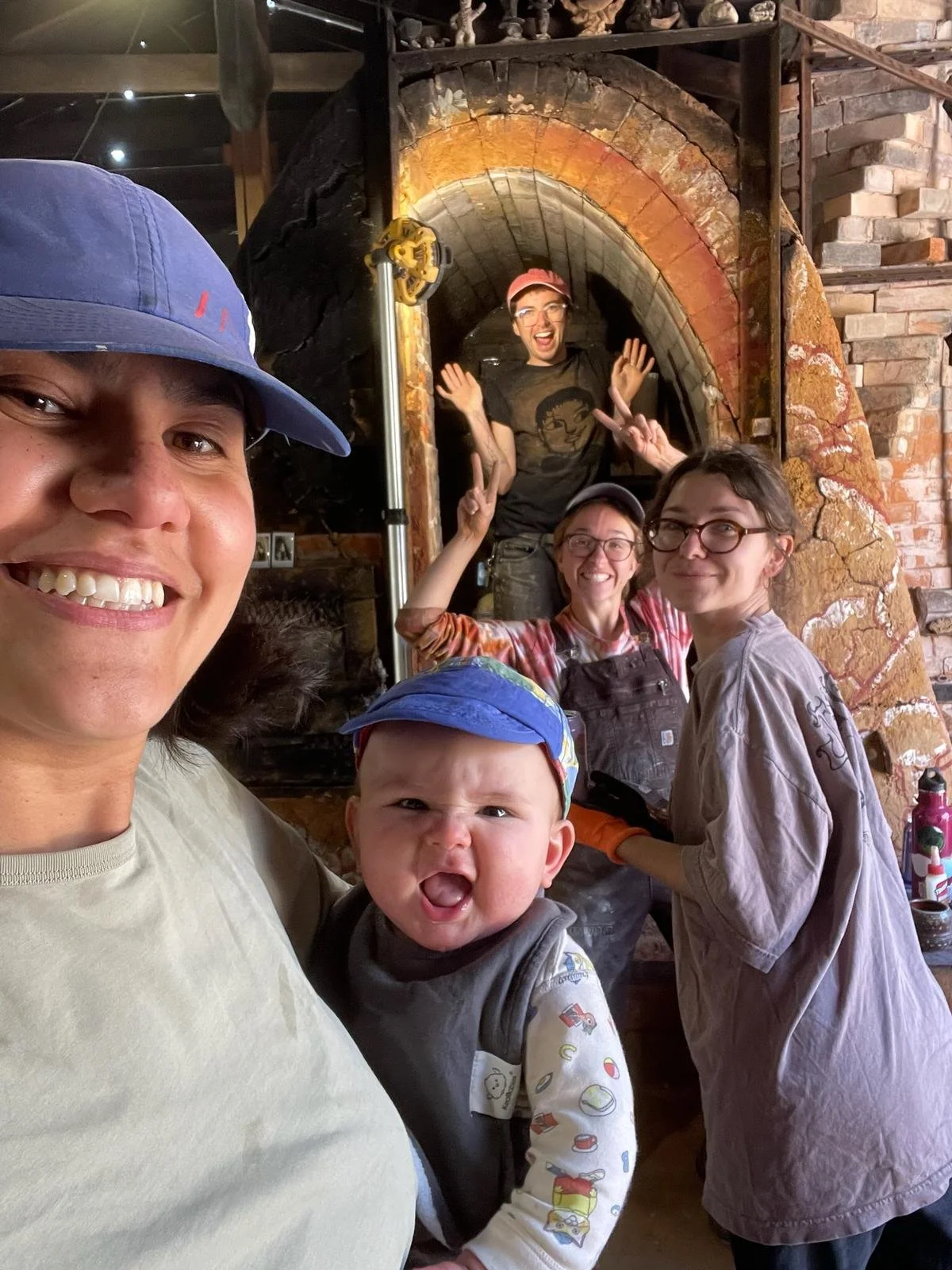 Lyra and baby Otis with Paige, Jules, and Dan