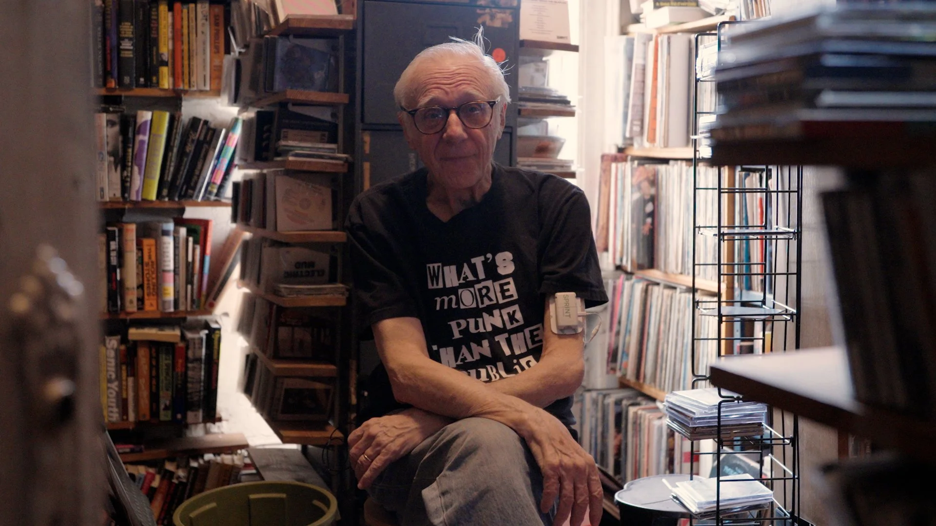 Robert Christgau at his desk in his apartment in the East Village of New York City, where he's been writing rock criticism for over 50 years