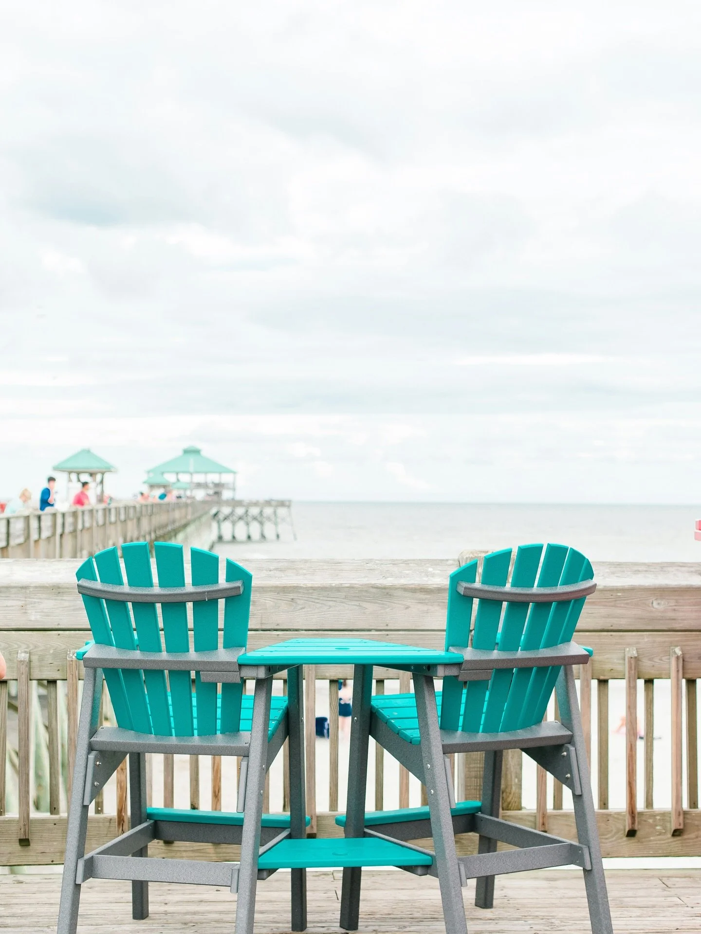Folly&rsquo;s pier has had quite a few lives. The first one went up in the 1930s, back when a wooden boardwalk and the ocean were enough to pull half of Charleston to the coast on a summer night. That version didn&rsquo;t survive the decades of storm