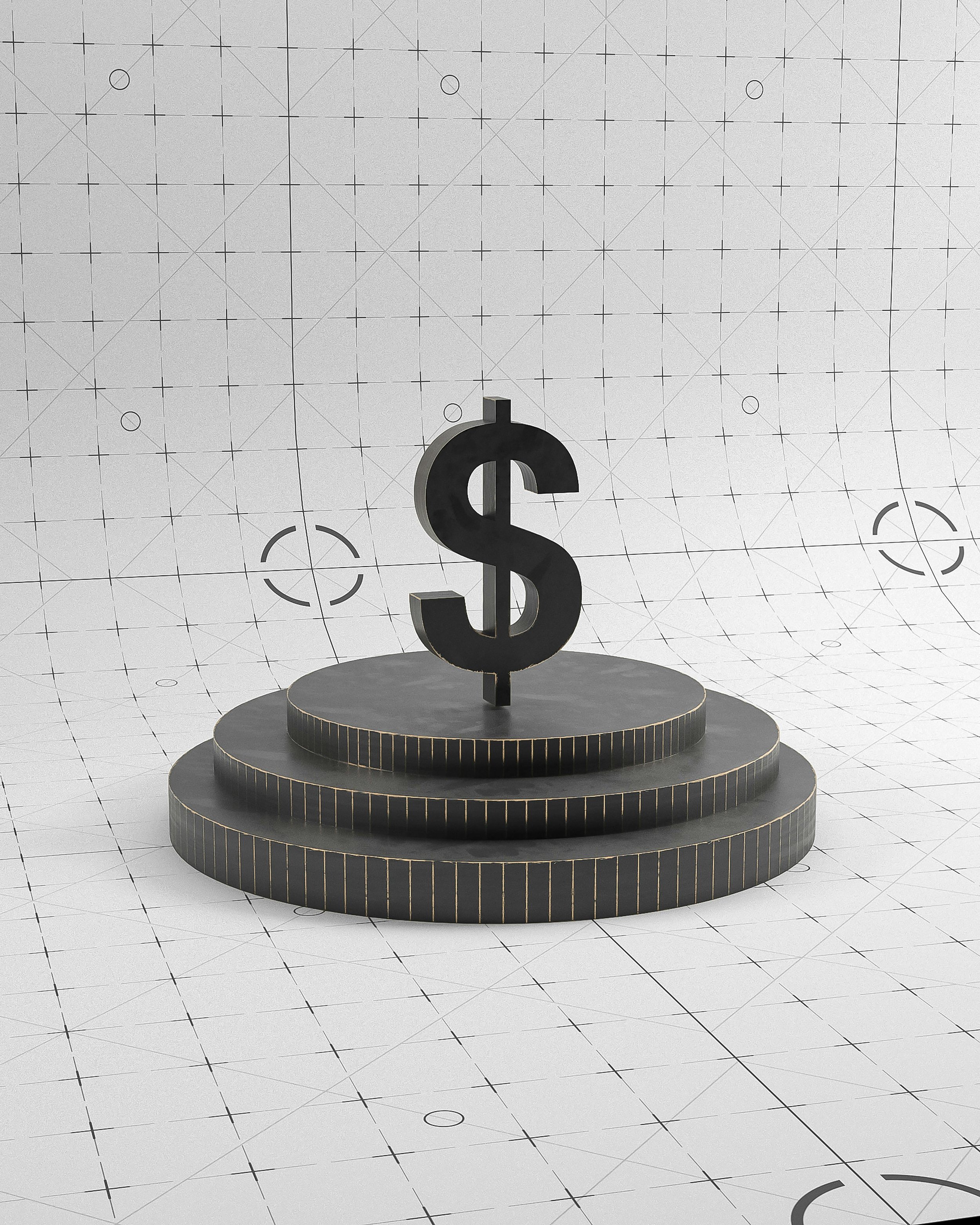 A metallic dollar sign sculpture on a tiered circular black platform with a textured gray backdrop that has a grid pattern and various markings.