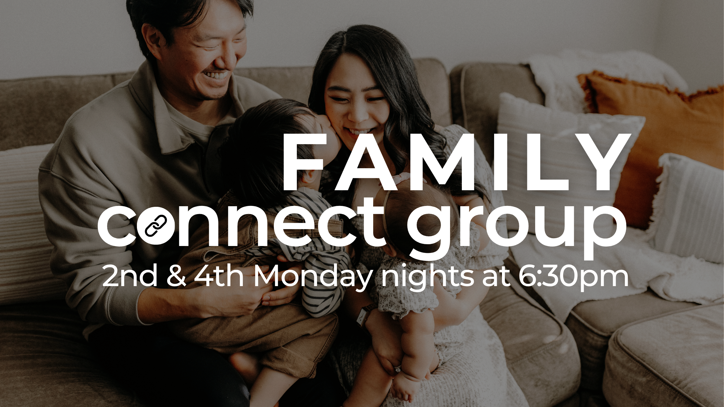 A family of four sitting on a sofa, smiling and hugging each other in a cozy living room. The walls are white, and there are cushions on the sofa. Overlaid text advertises a family connect group meeting every 2nd and 4th Monday at 6:30 pm.