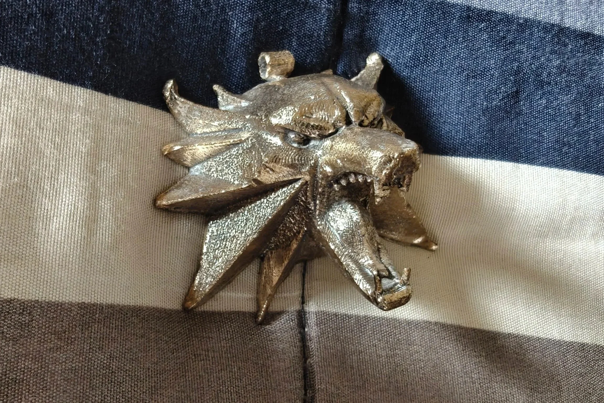 Bronze casting from 3D print of the School of the Wolf medallion from the "Witcher", 2.1' x 2.3', 2025