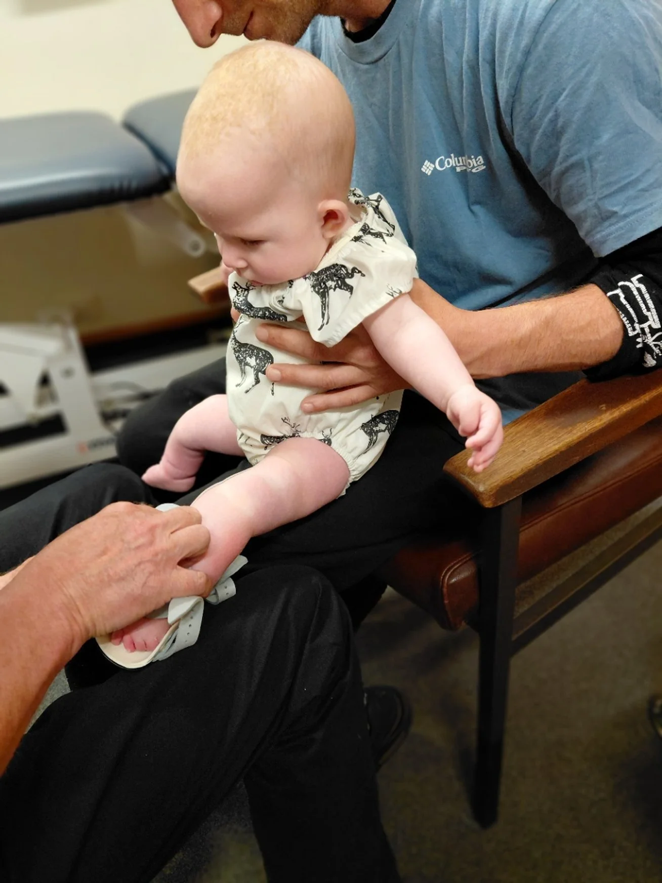 hannah-rose getting size checked for her clubfeet arthrogryposis from orthotic service  