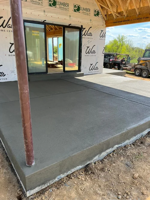 Custom stamped concrete patio with built-in seating