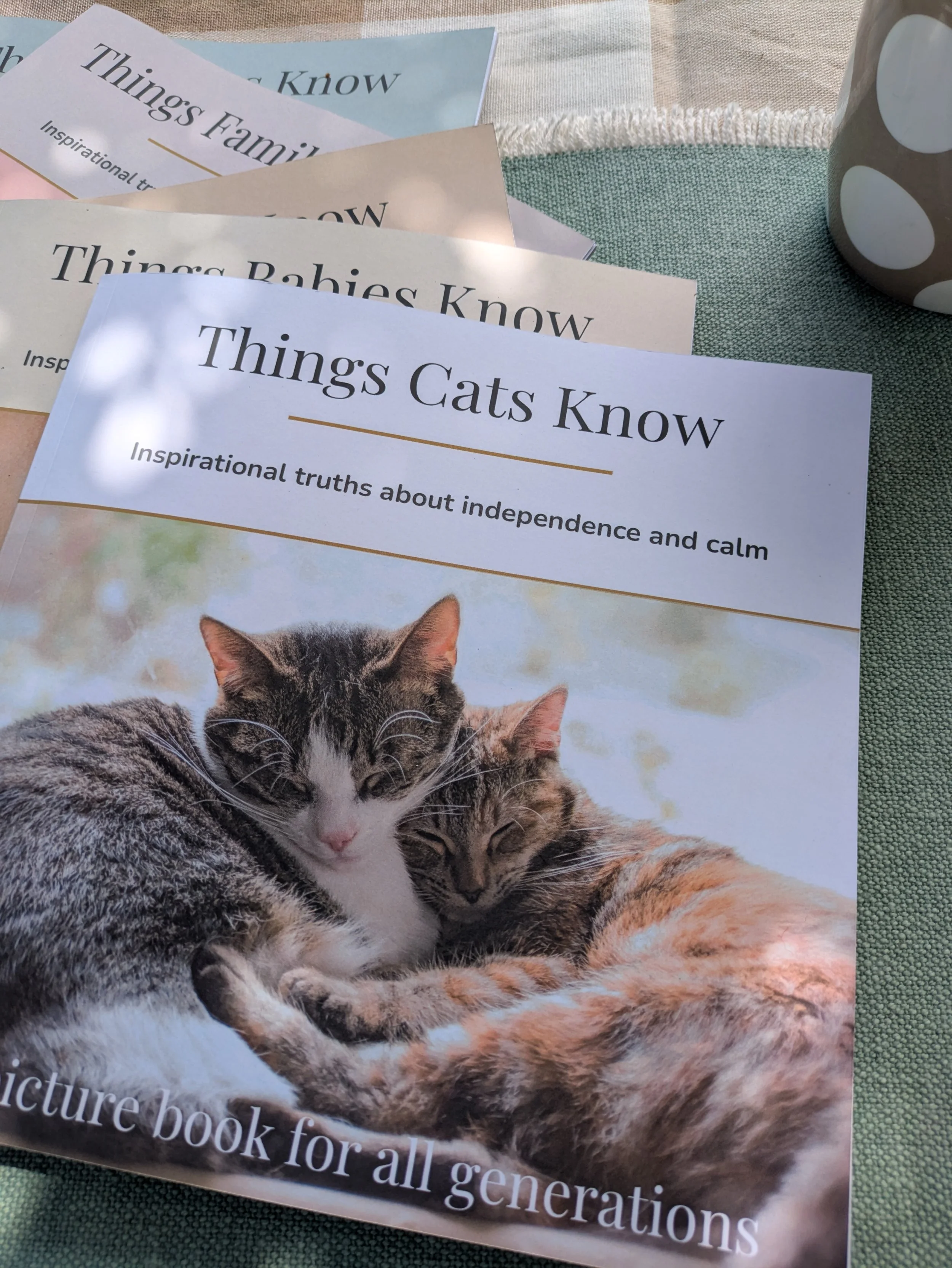 cute cats on cover of book 'Things Cats Know' for dementia patients