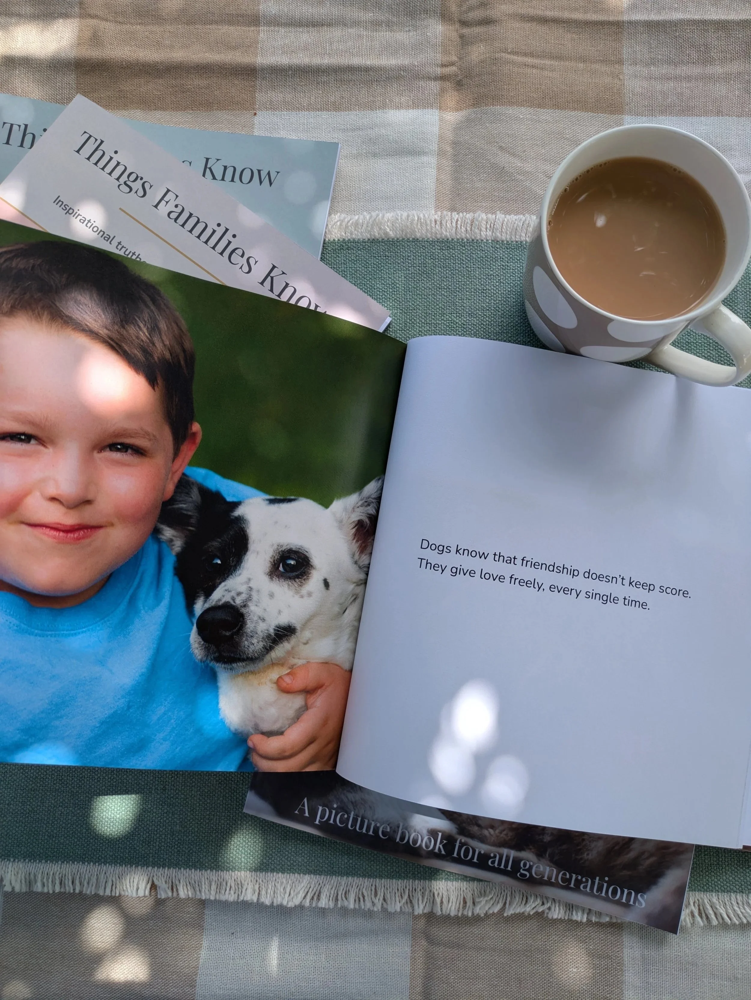 cute picture in a book of a boy with is pet dog