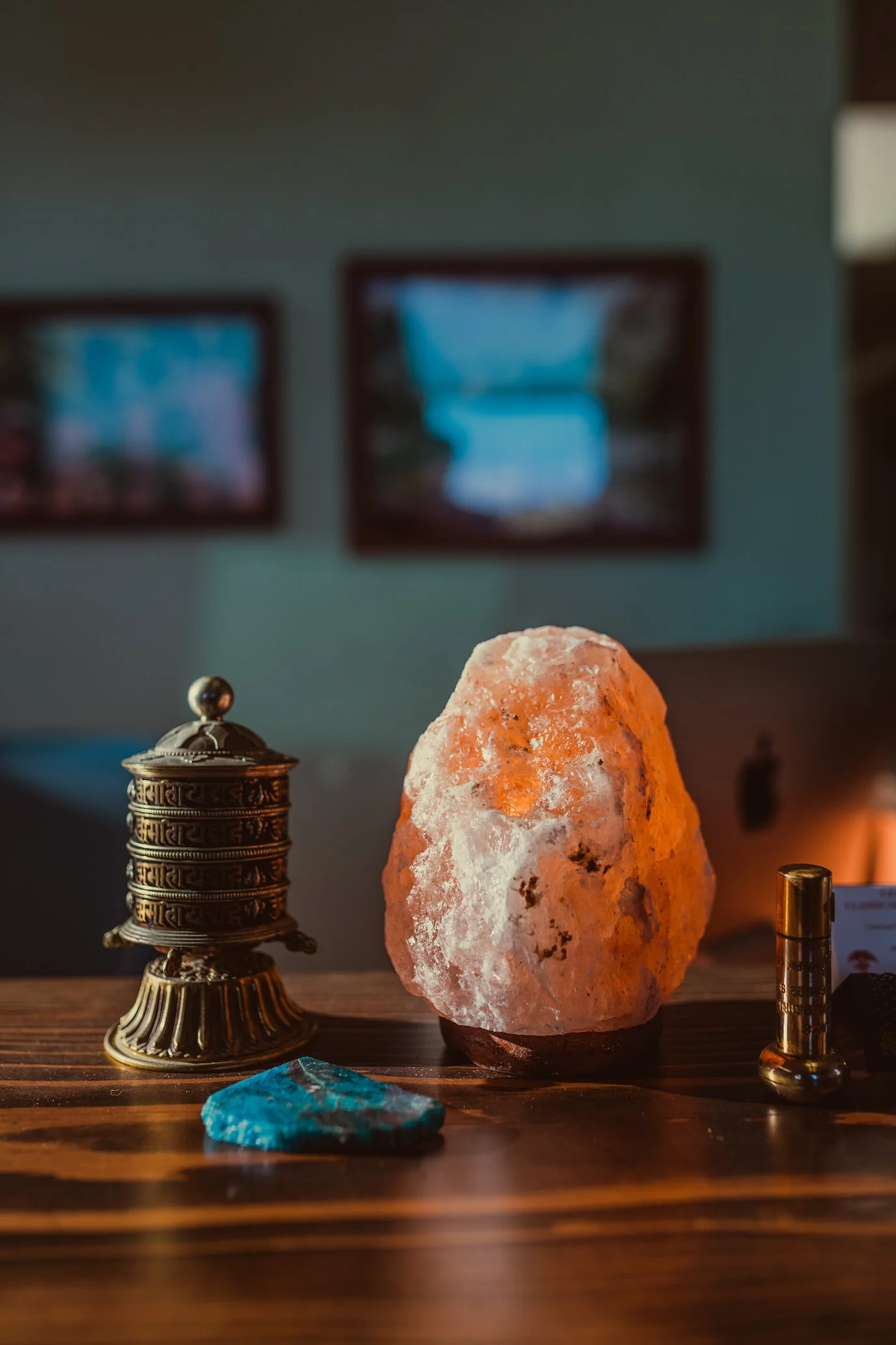 Close-up of a glowing Himalayan salt lamp on the clinic’s front desk at the Center for Classical Chinese Medicine in San Luis Obispo, symbolizing calm, renewal, and holistic well-being.