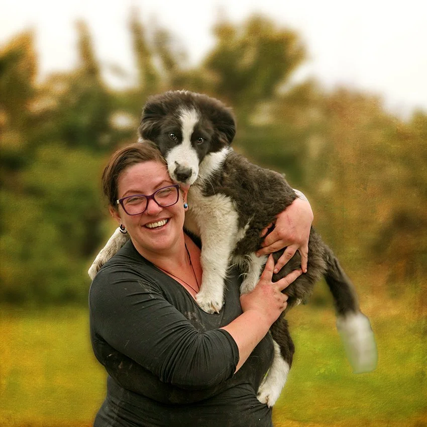 woman and her puppy