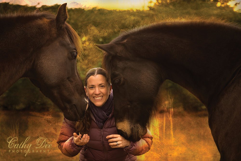 Woman with two horses