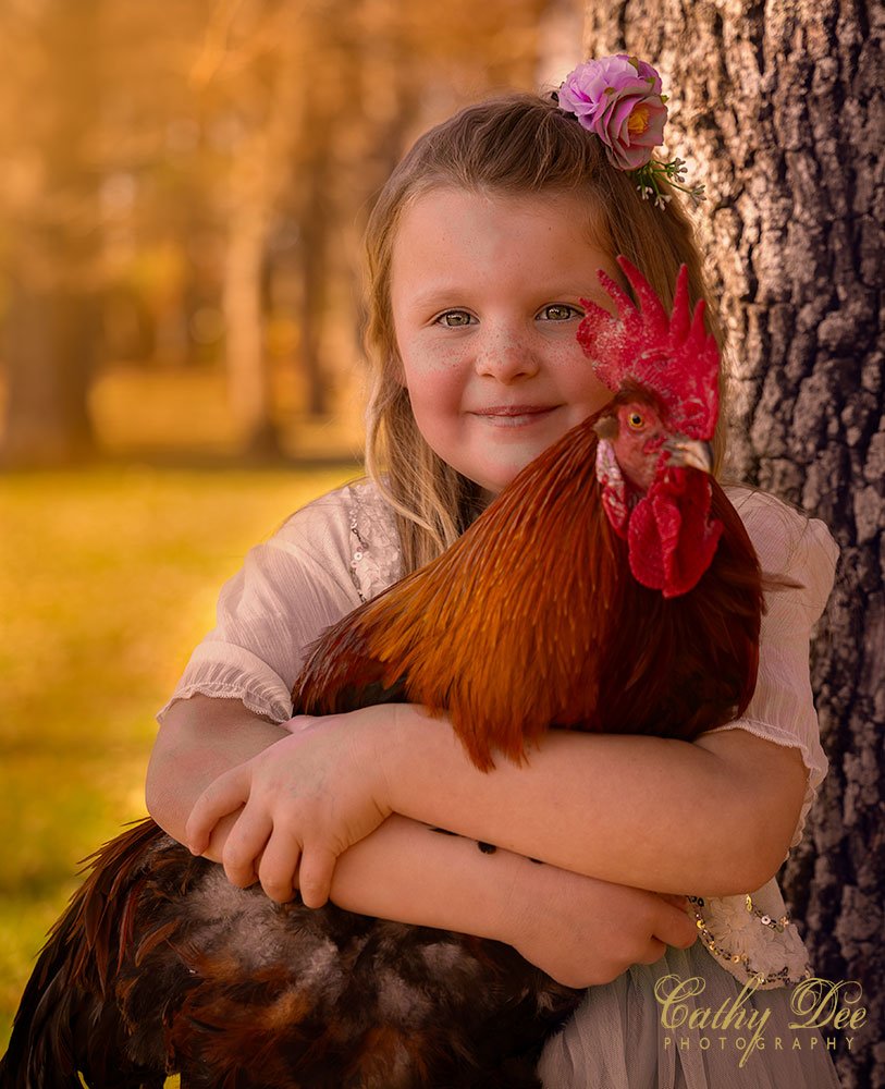 girl with pet rooster
