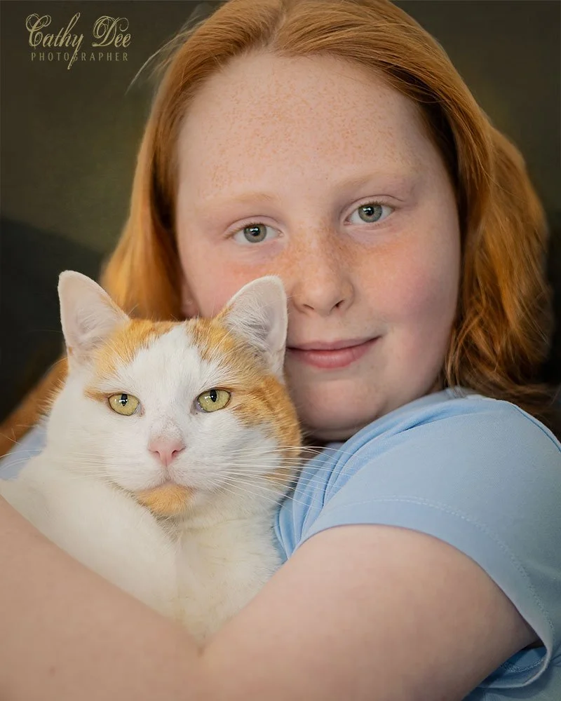 girl with pet cat