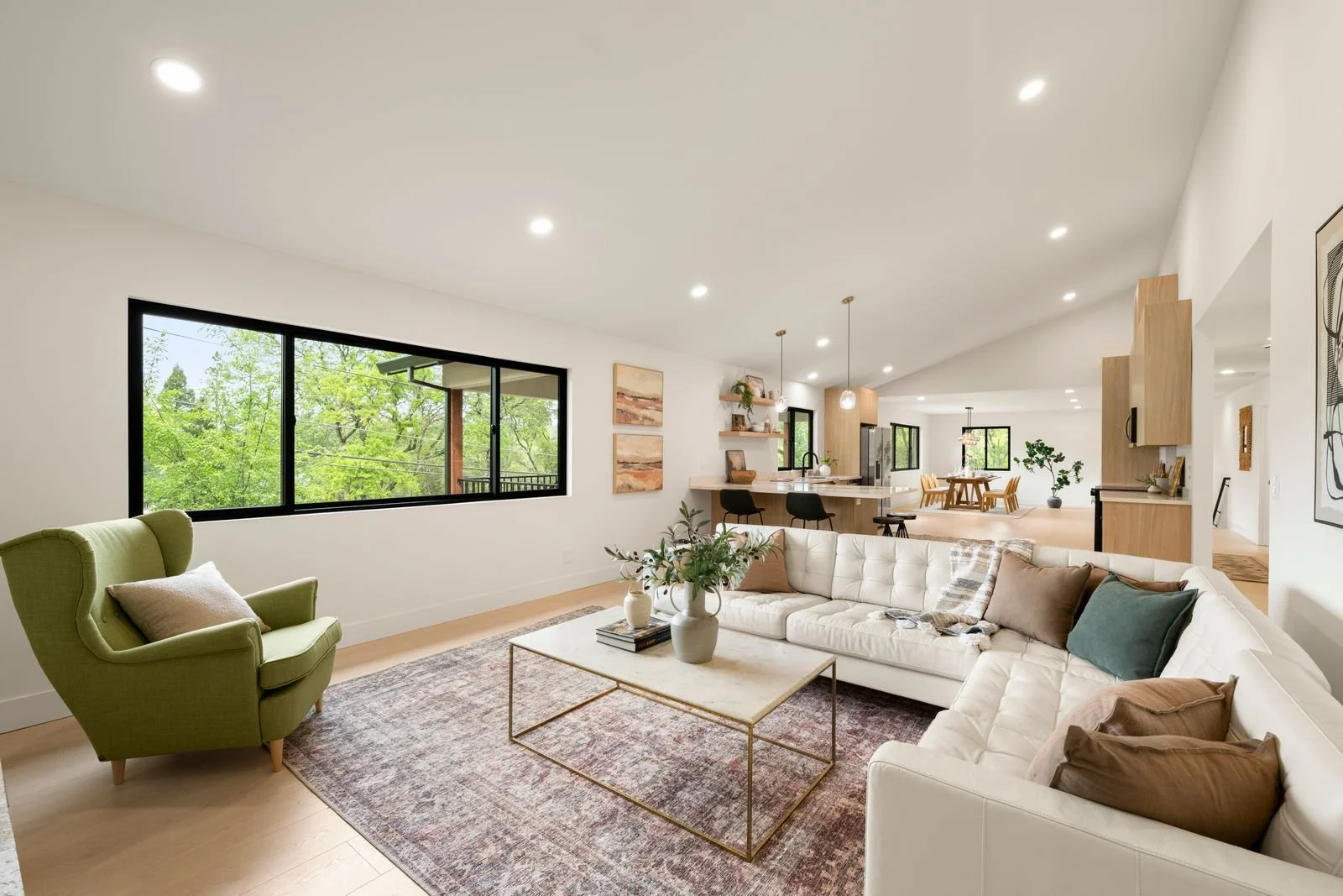 huge living room with a cozy fireplace and lots of entertainment