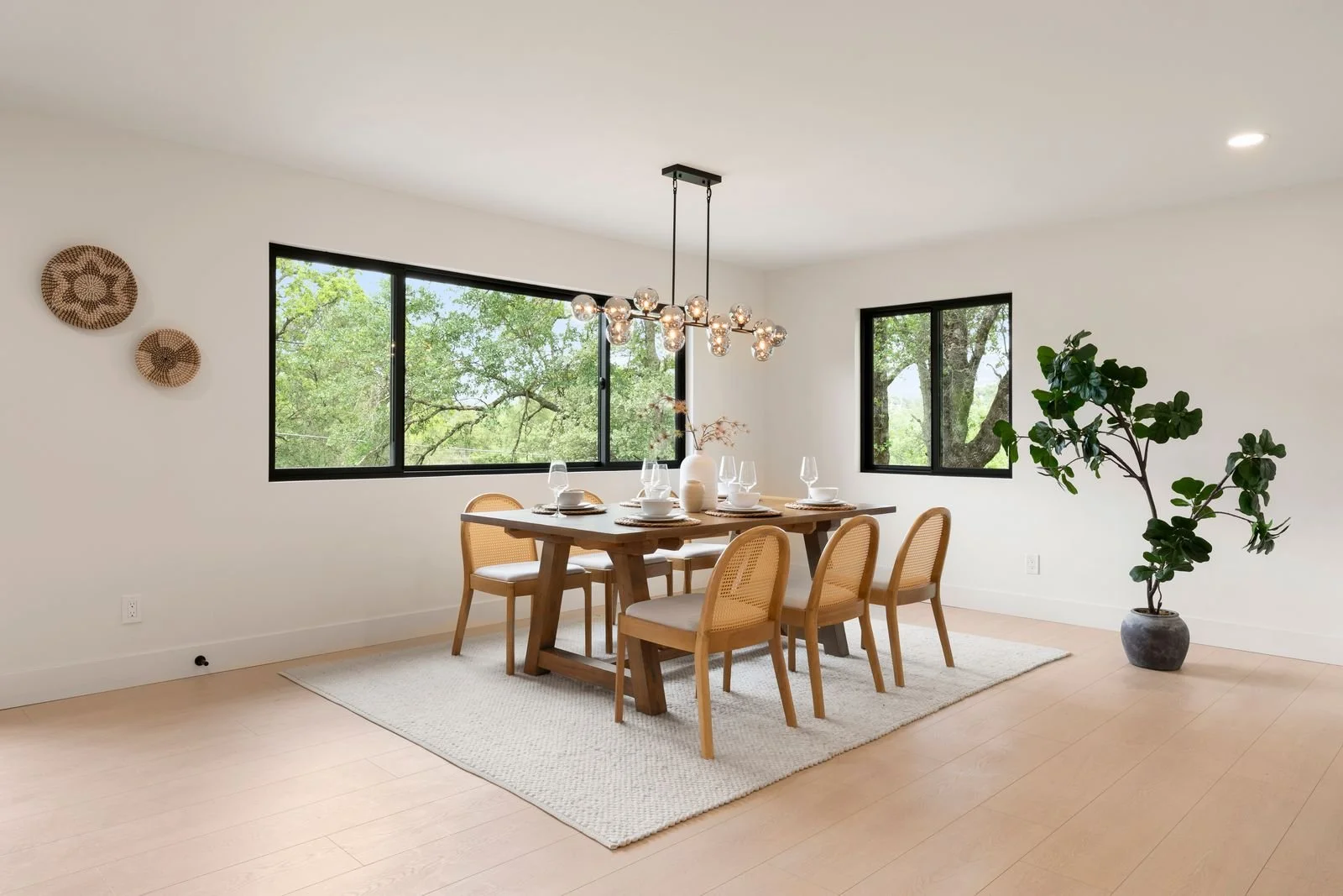 spacious dining room with lots of natural light flowing through the windows