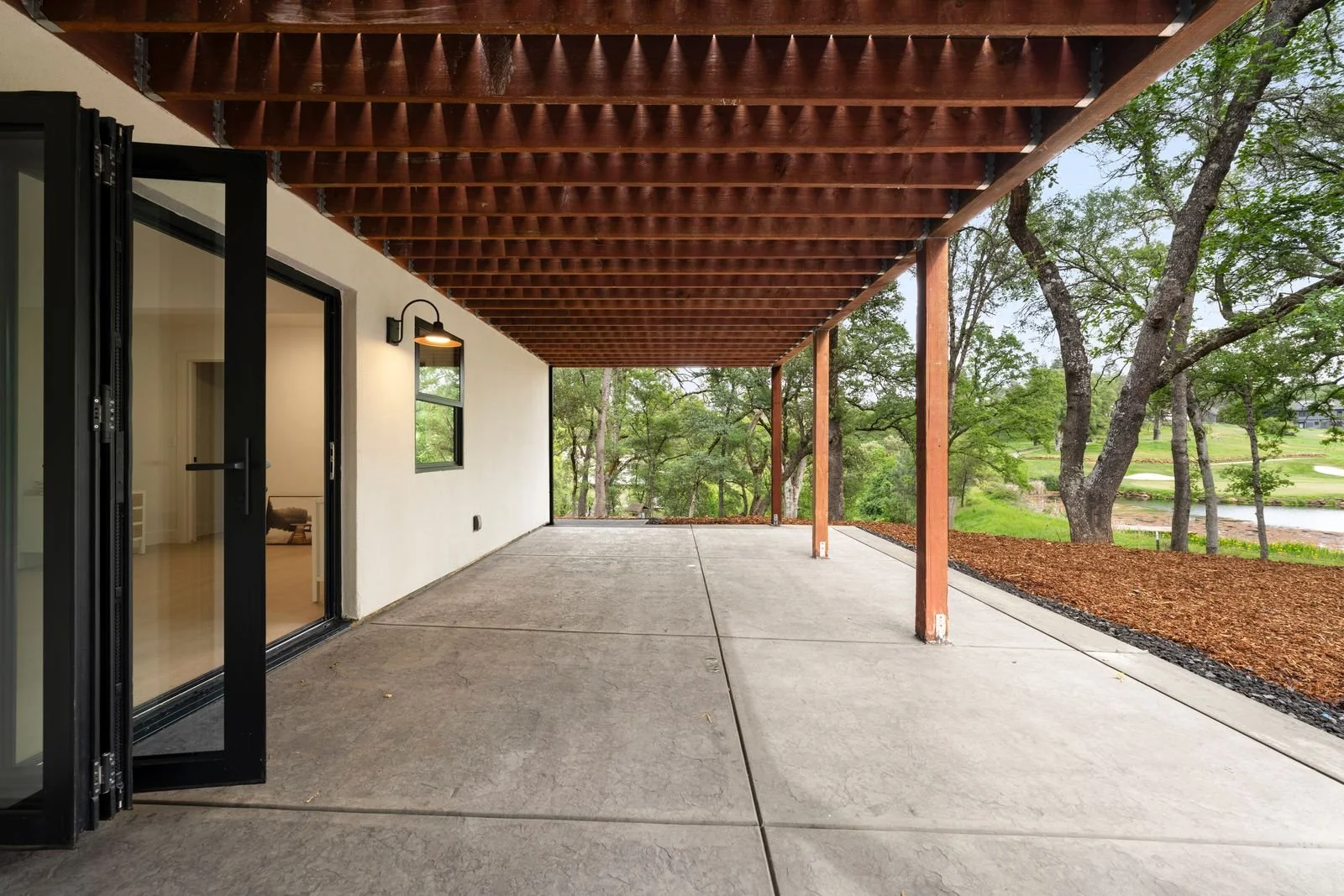 covered porch that opens to downstairs living  area