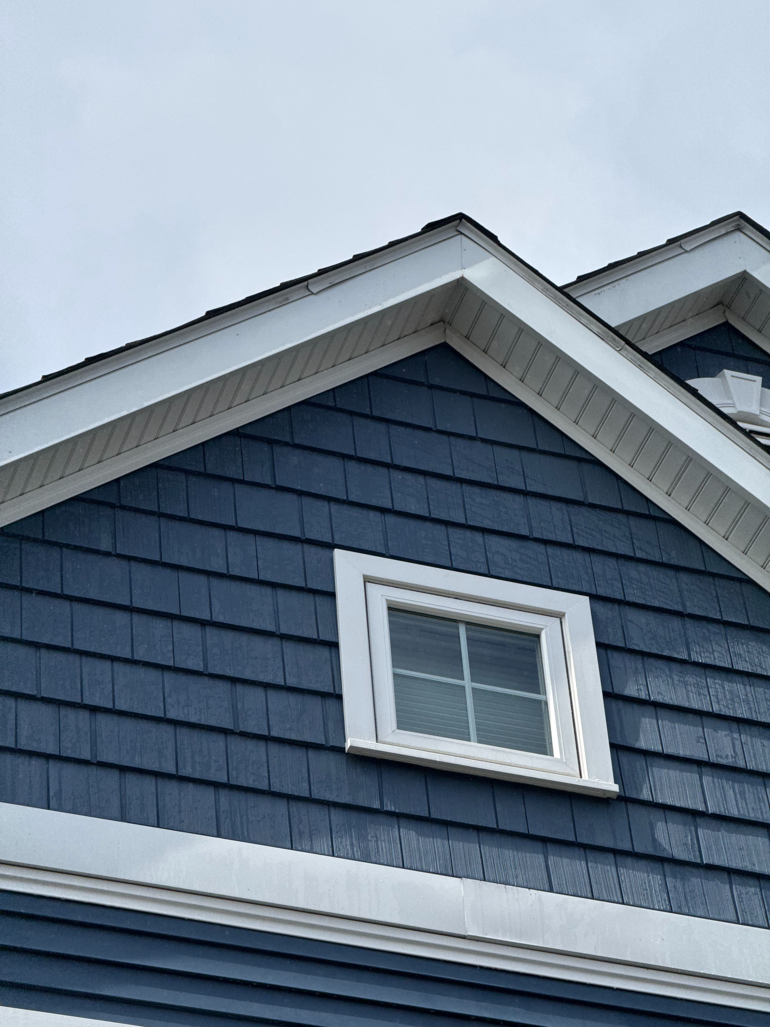 After: Milton, MA house after soft washing. Safely removed dirt and algae build up to brighten siding and trim.