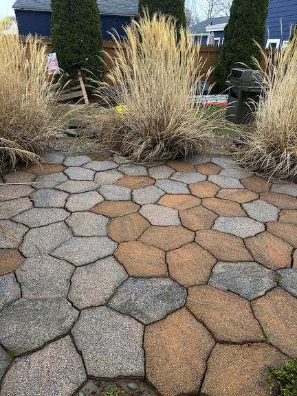 After: Patio pavers after professional pressure washing in Weymouth, MA, with moss and buildup removed for a cleaner outdoor space.
