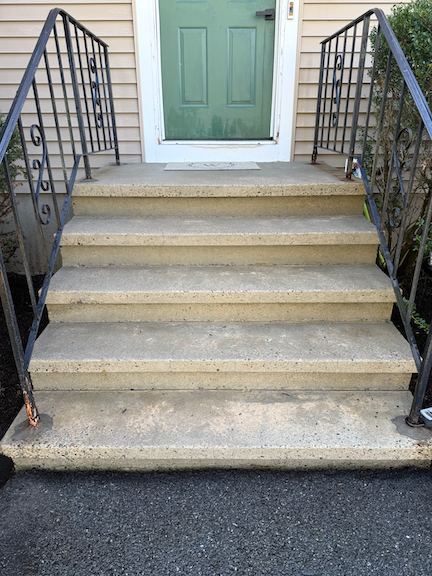 After: Concrete front steps after professional pressure washing in Randolf MA, with surface buildup removed for a cleaner, refreshed entryway.