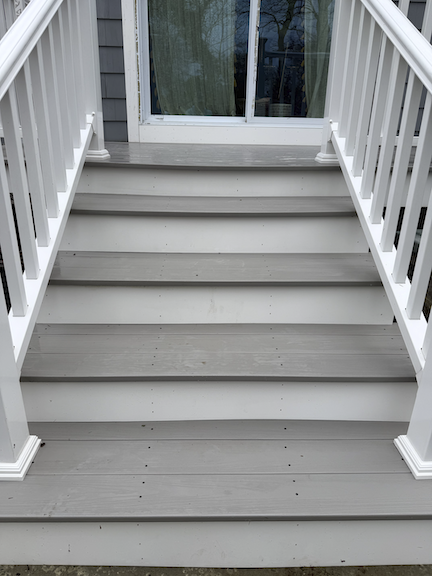 After: Deck stairs after professional cleaning in Braintree, MA, with buildup removed for a brighter, refreshed outdoor entryway.