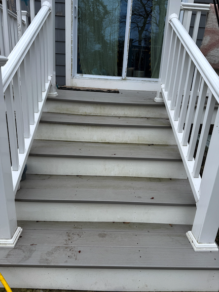 Before: Deck stairs in Braintree, MA with dirt, mildew, and weather-related buildup before professional exterior cleaning.