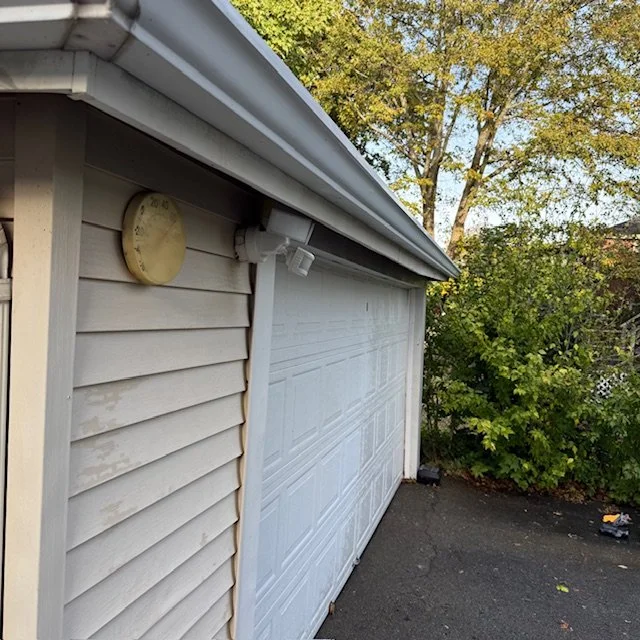 After: Gutter after professional cleaning in Quincy, MA — restoring a clean, polished look to the home’s trim.