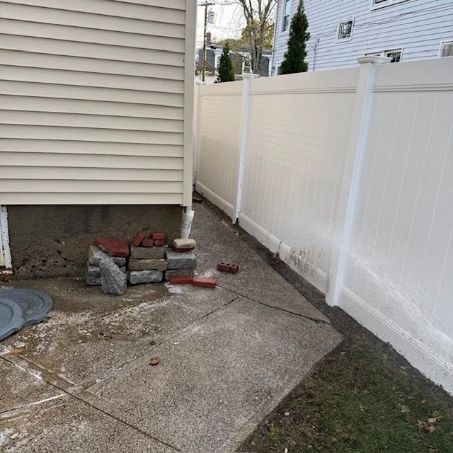 After: Walkway after pressure washing in Quincy, MA — moss removed and surface restored to a clean, safe finish.