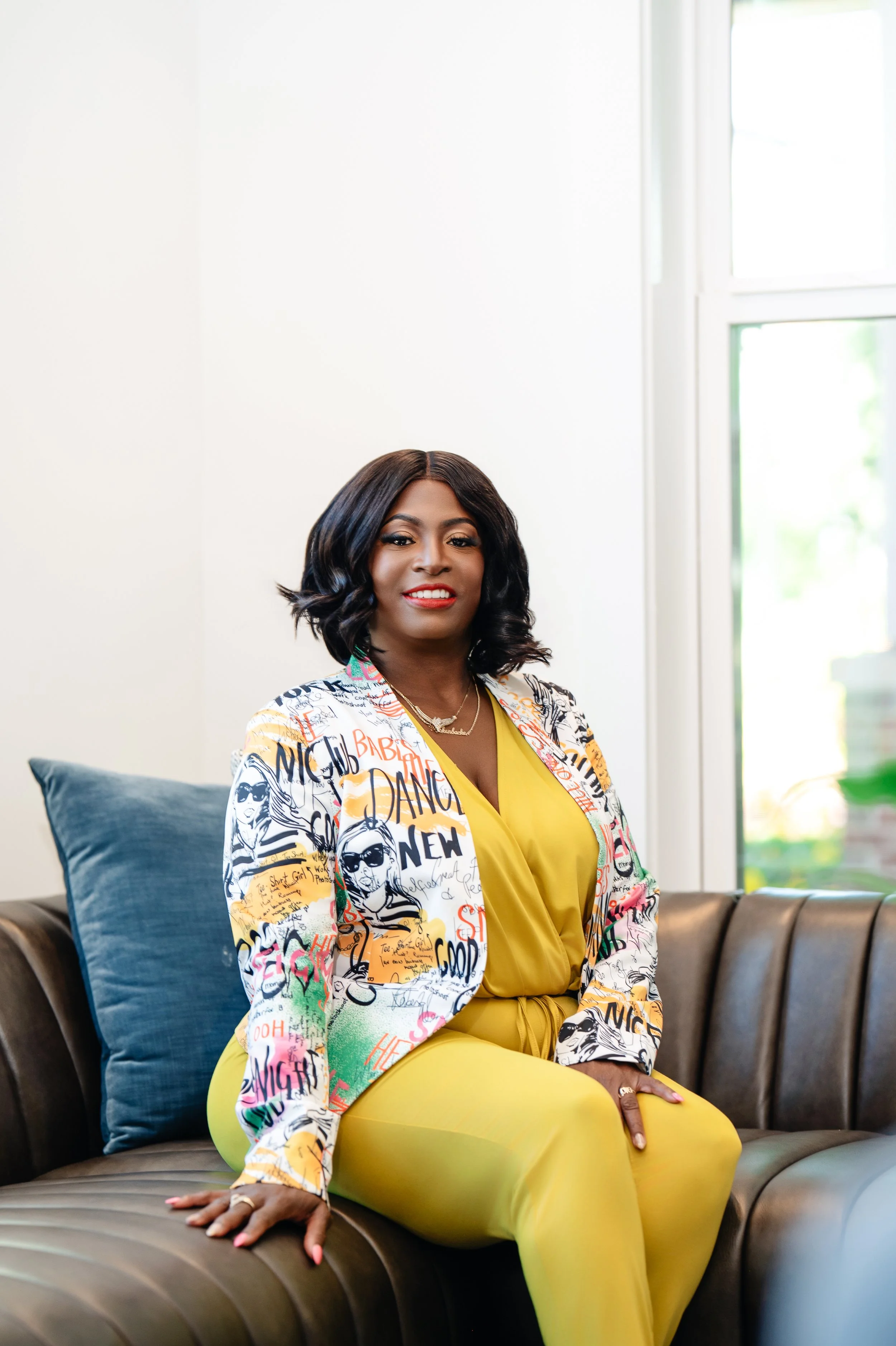 The Owner of Rickenbacker's Tax Preparation Services sitting on a couch.