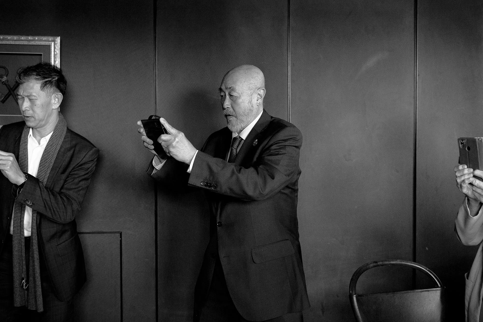 Wedding guest taking a photo