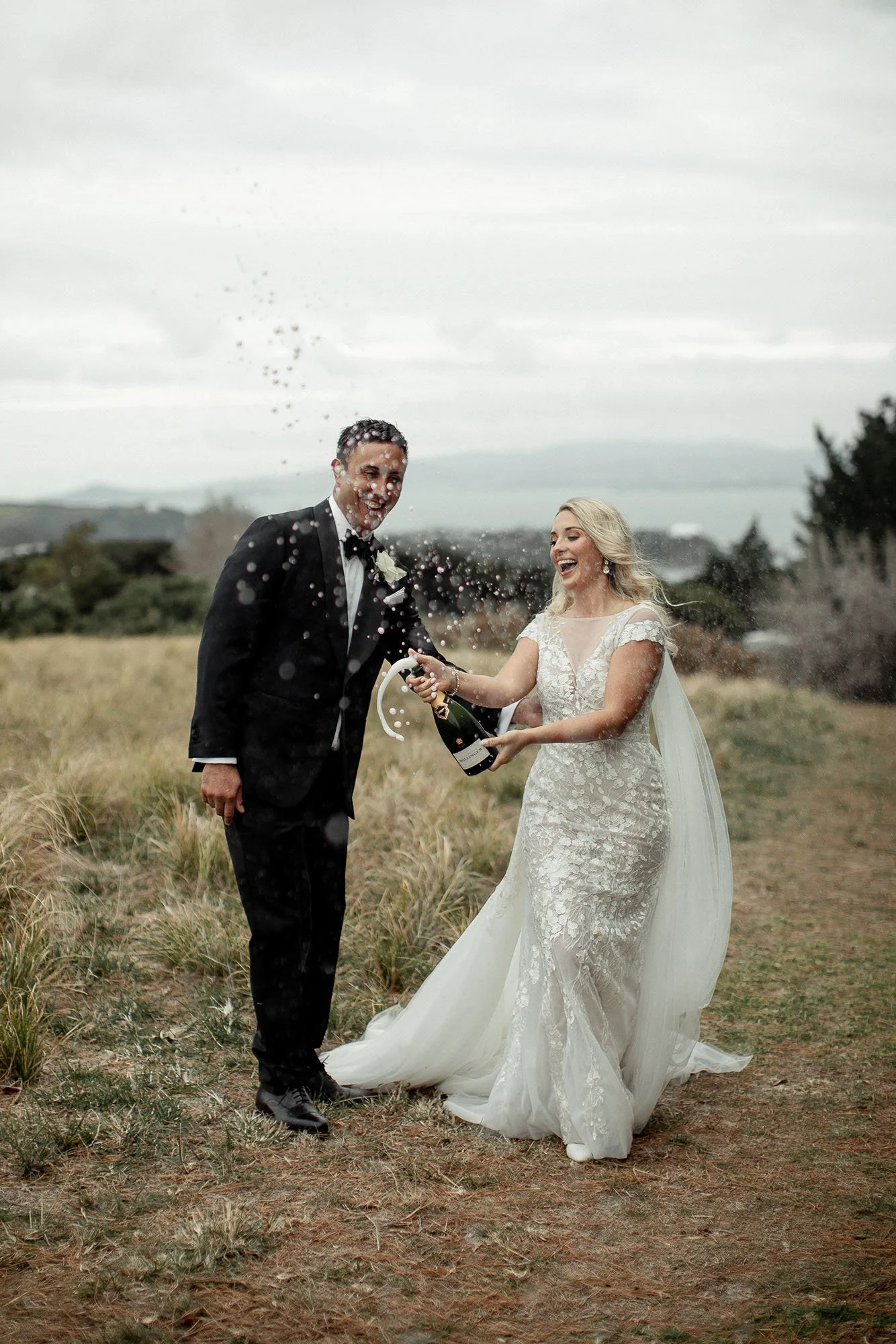Popping champagne at Mudbrick with Sarah and Michael
