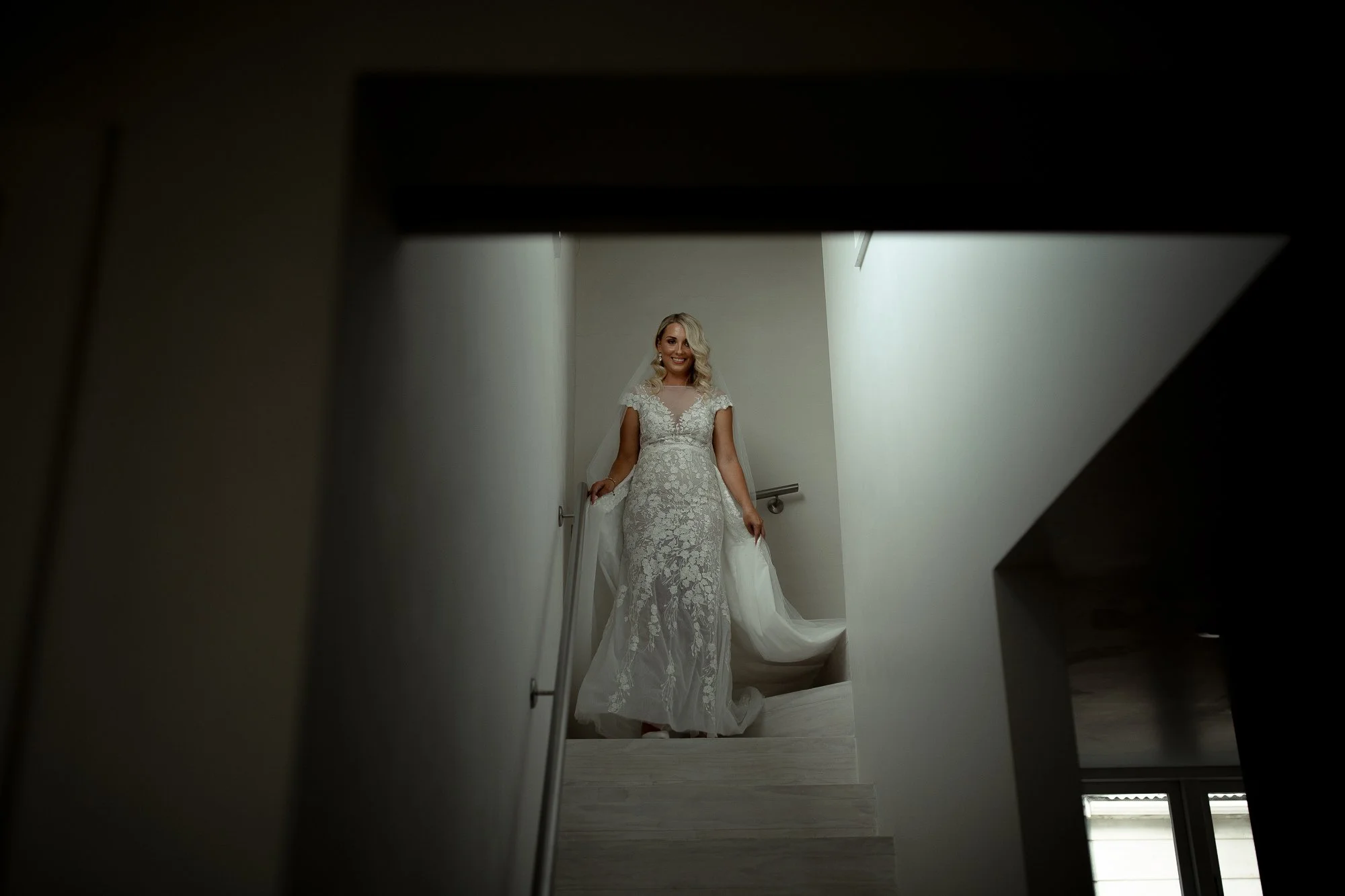 Bride coming down the stairs