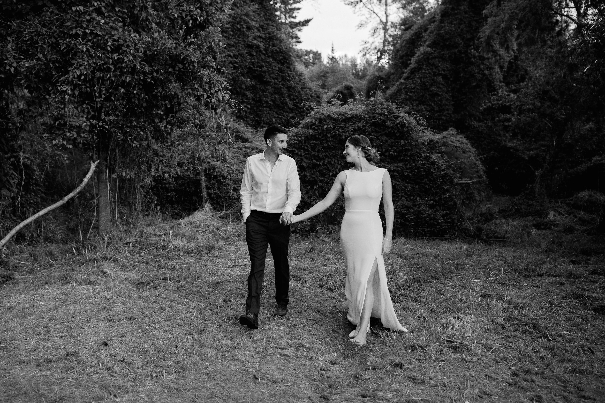 Bride and groom hand in hand
